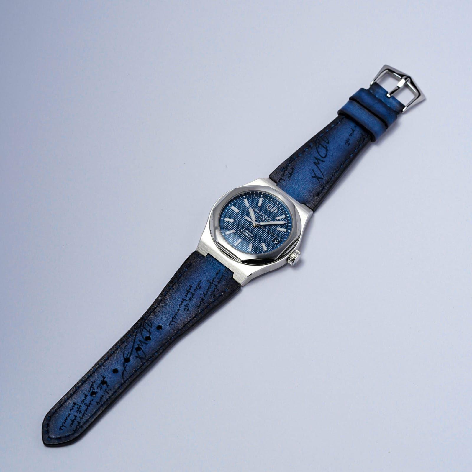 Blue Patina Scritto Strap on Girard Perregaux watch by Gunny Straps