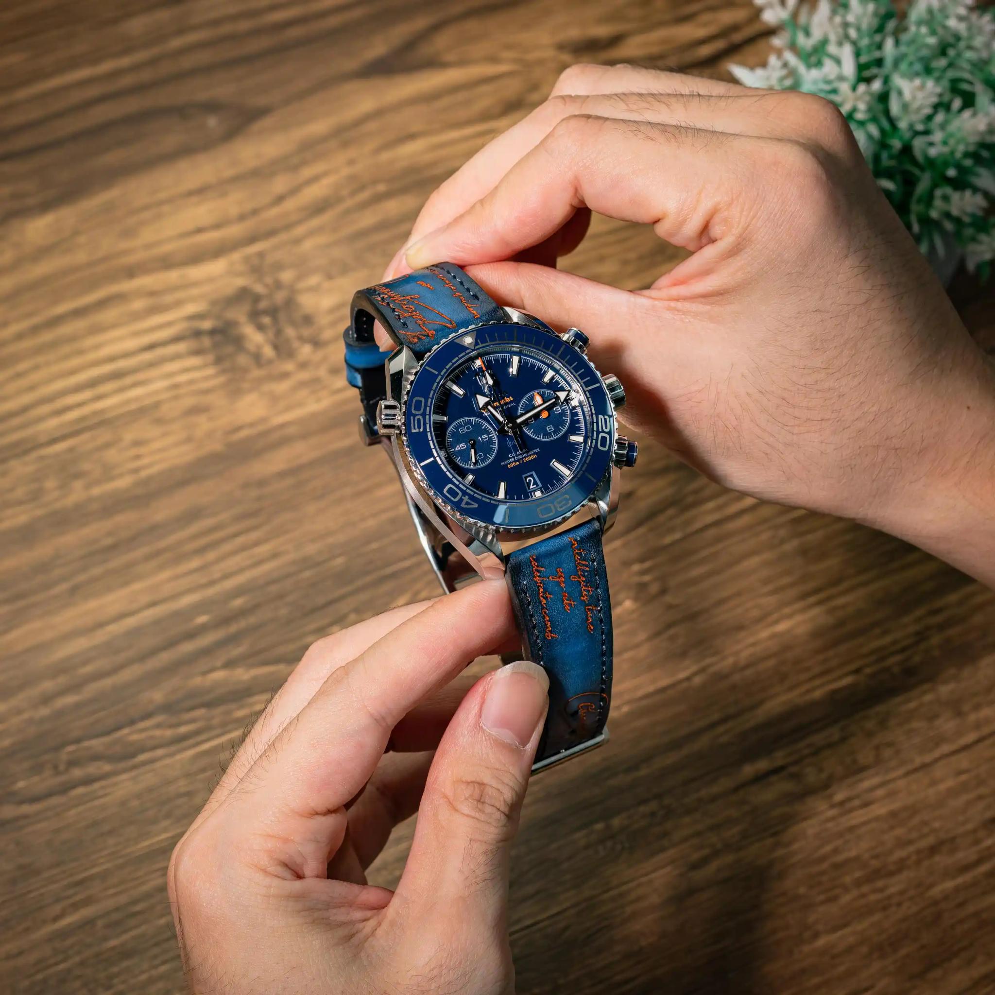 Omega Leather Strap – Dark Blue Patina with Orange Scritto
